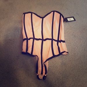 Sheer nude bodysuit with black boning